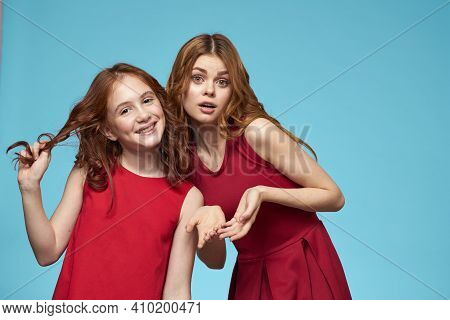 Cheerful Mom And Daughter Hugs Joy Lifestyle Communication Friendship Blue Background