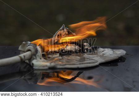The Concept Of A Household Appliance Fire. The Final Stage Of Extension Cord Fire Due To A Short Cir
