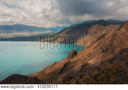Bartogay Reservoir On The Chilik River Surrounded By The Tien Shan Mountains In The Almaty Region