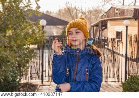 Girl In A Blue Jacket Winter. Girl In A Blue Jacket For A Walk.