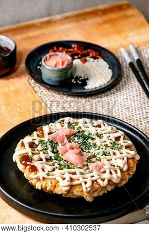 Homemade Japanese Fast Food Okonomiyaki Cabbage Pancake Decorated By Spring Onion, Pickled Ginger, M