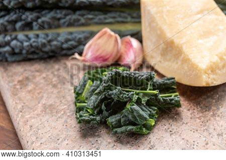 Cooking With Black Flat Leaves Of Cavolo Nero Tuscan Cabbage