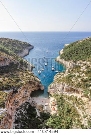 Aerial Drone Shot Of Iconic Stiniva Cove Beach Of Adriatic Sea On Vis Island In Croatia Summer
