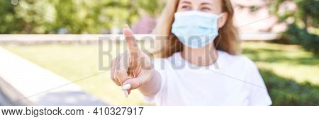 Young Woman Wearing Protective Mask Outdoors. Medicine Equipment. Pandemic Safety Concept. White T-s
