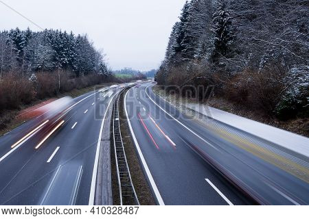Light Traces Of Traffic On The Highway On A Cold Winter Day, Long Exposure - Image