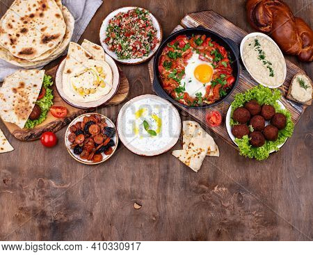 Traditional Jewish Food. Hummus, Falafel, Shakshuka, Tsimes, Forshmak And Pita