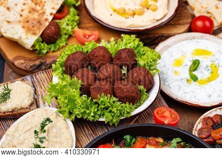 Traditional Jewish Food. Hummus, Falafel, Shakshuka, Tsimes, Forshmak And Pita