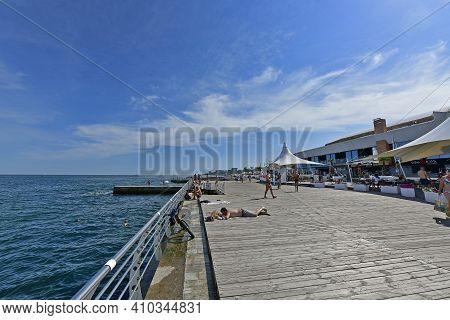 Ukraine, Odessa 07/27/2020. Lanzheron Beach. A Picturesque Embankment With Palm Trees, Fountains, Ge