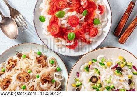 Konjac Pasta Dishes With Various Vegan Toppings, Shot From Above