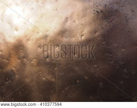 Metal Bronze Textured Plate. Bronze Or Copper Polished Surface With Dents, Scratches And Indentation