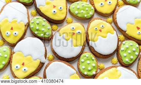 Easter Sugar Cookies Background. Buttery Easter Egg Biscuits With Meringue. Easter Chickens Cookies.