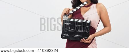 Asian Woman Hold Black Clapper Board Or Movie Slate Isolated On White Background. ,show Film,movies 