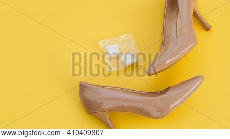 Foot Silicone Toe Separator And Beige Shoes. Valgus On Female Feet. Prevention And Treatment Of Hall