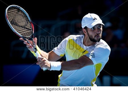 MELBOURNE - 14 gennaio: Fernando Verdasco di Spagna nella sua prima vittoria rotonda sopra David Goffin di Belg