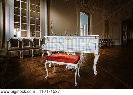 Rundale, Latvia - November 09, 2020: Grand Piano In The White Hall Of Rundale Palace