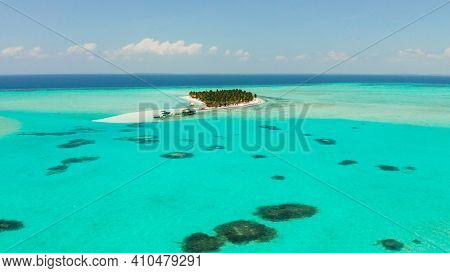 Tropical Island In The Ocean With Palm Trees On White Sand Beach. Onok Island, Balabac, Philippines.