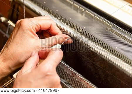 Womans Hands Working With Knitting Machine, Knitting As Womans Hobbies. Small Business Of Garment Ma