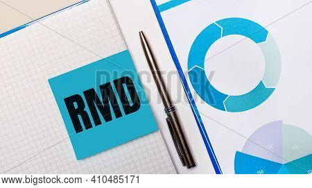 There Is A Pen Between The Blue Sticky Note With The Text Rmd Required Minimum Distributions