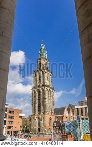 Groningen, Netherlands - March 14, 2020: Pillars Of The Town Hall And The Martini Tower In Groningen
