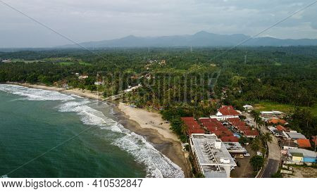 Aerial View Of Karang Bolong Beach And Its Wonderful Sunset View. At Anyer Beach With Noise Cloud An