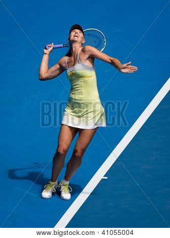 MELBOURNE - 14. ledna: Maria Sharapova Ruska v jejím prvním kole vyhrát nad Olga Puchkova nebo Russi