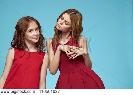 Cheerful Mom And Daughter Hugs Joy Lifestyle Communication Friendship Blue Background