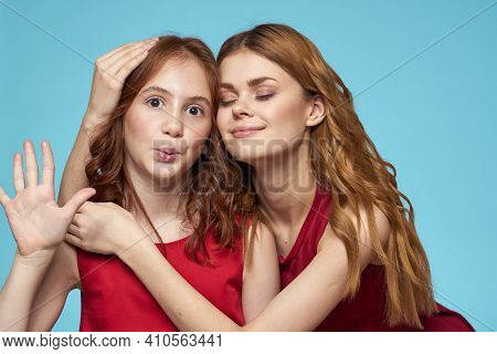 Cheerful Mom And Daughter Hugs Joy Lifestyle Communication Friendship Blue Background