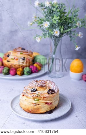 Craffin (cruffin) With Raisins, Nuts And Candied Fruits. Easter Bread Kulich And Painted Eggs. Easte