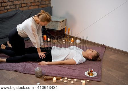 Relax And Enjoy In Spa Salon Getting Thai Massage By Professional Masseur Woman Lying Floor Blanket 