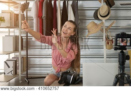 Attractive Young Woman Caucasian Smiling And Greeting Her Smartphone. Female Blogger Is Recording Cl
