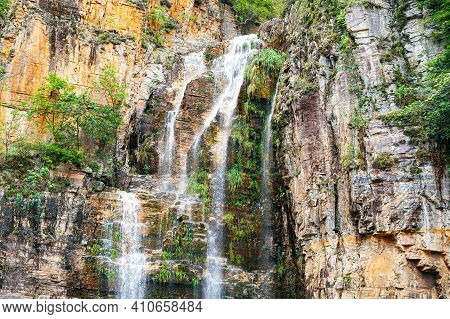 Close Up View At The Waterfall Of Canyons Of Furnas, At Capitólio Mg, Brazil. Waterfall Flowing Betw