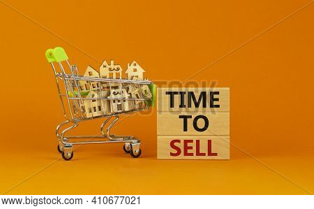 Time To Sell Real Estate Symbol. Wooden Blocks, Words 'time To Sell' On Beautiful Orange Background.