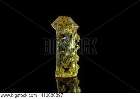 Macro Mineral Beryl Heliodor Stone On Black Background