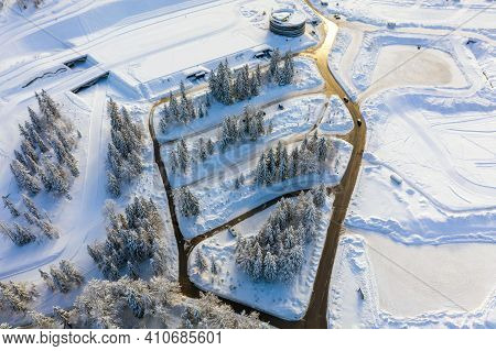Aerial View Of Ski Jump In Planica, Slovenia At Ratece Near Kranjska Gora In Winter With Snow.