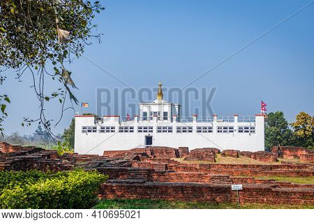 Lumbini, Nepal - February 23 2021: Holy Maya Devi Temple In Lumbini, Nepal. Sacred Pilgrimage Site F