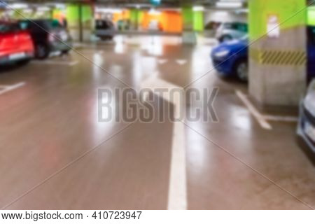 Garage Car Blurred. Car Lot Parking Space In Underground City Garage. Empty Road Asphalt Background 