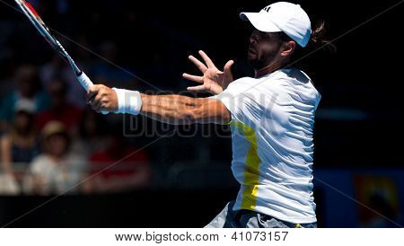MELBOURNE - 14 gennaio: Fernando Verdasco di Spagna nella sua prima vittoria rotonda sopra David Goffin di Belg