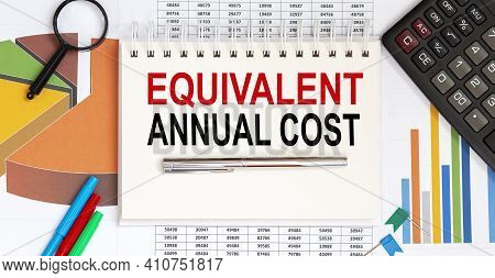 Notebook With Tools And Notes Text Equivalent Annual Cost With Chart