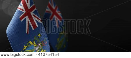 Small National Flags Of The Pitcairn Islands On A Dark Background