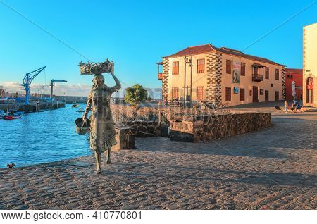 Puerto De La Cruz, Tenerife,spain  - June 06, 2018:   La Pescadora, Bronze Monument Dedicated To The