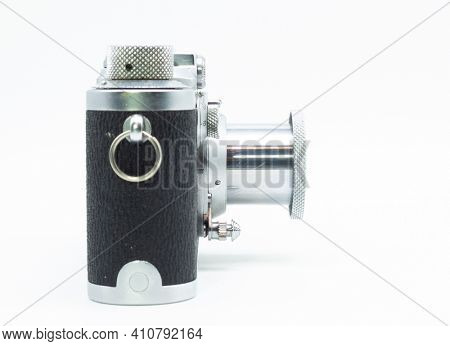 DUSSELDORF, GERMANY - FEBRUARY, 2021: Side view of famous 35mm film camera Leica IIIc isolated on white background