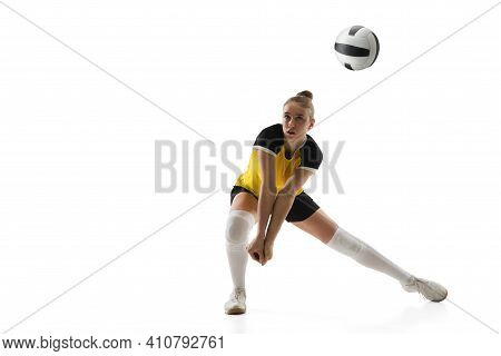 In Jump. Young Female Volleyball Player Isolated On White Studio Background. Woman In Sportswear Tra