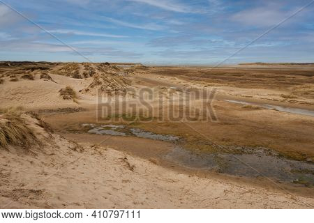 Walking Through The Slufter Valley On The Wadden Island Of Texel, A Sandy Plain That Is Openly Conne