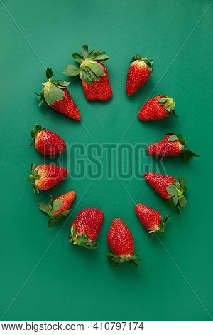 Fresh Red Strawberries On The Green Background