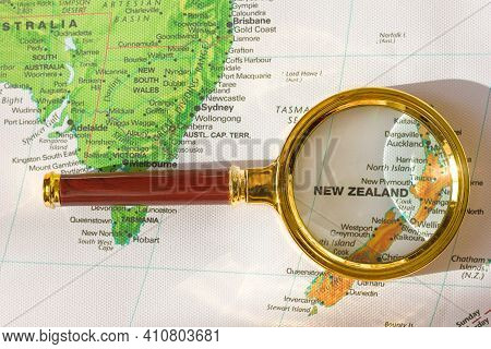 Lviv Ukraine-01 20 2021 : Australia New Zealand  On A Map In A Defocused Magnifying Glass, The Theme