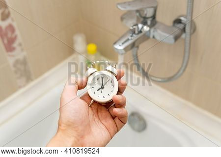 Time To Take A Shower Or A Bath. Hygienic Concept. Inspection Of Water. Selective Focus