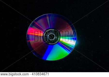 Cd Dvd Isolated On Black, Cd Dvd Background, Disk In The Dark