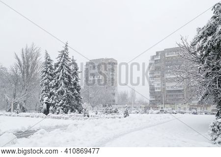 Odessa, Ukraine - January, 28 2021: Snow-covered Winter Street In A City, Trees Covered With Ice And