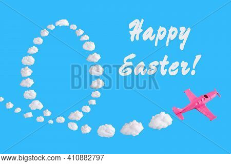 Pink Airplane Goes Into A Turn On Blue Background With Text Happy Easter And Easter Egg Of Abstract 