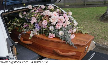 Closeup Shot Of A Funeral Casket Or Coffin In A Hearse Or Chapel Or Burial At Cemetery